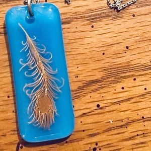 Gold peacock feather blue pendant